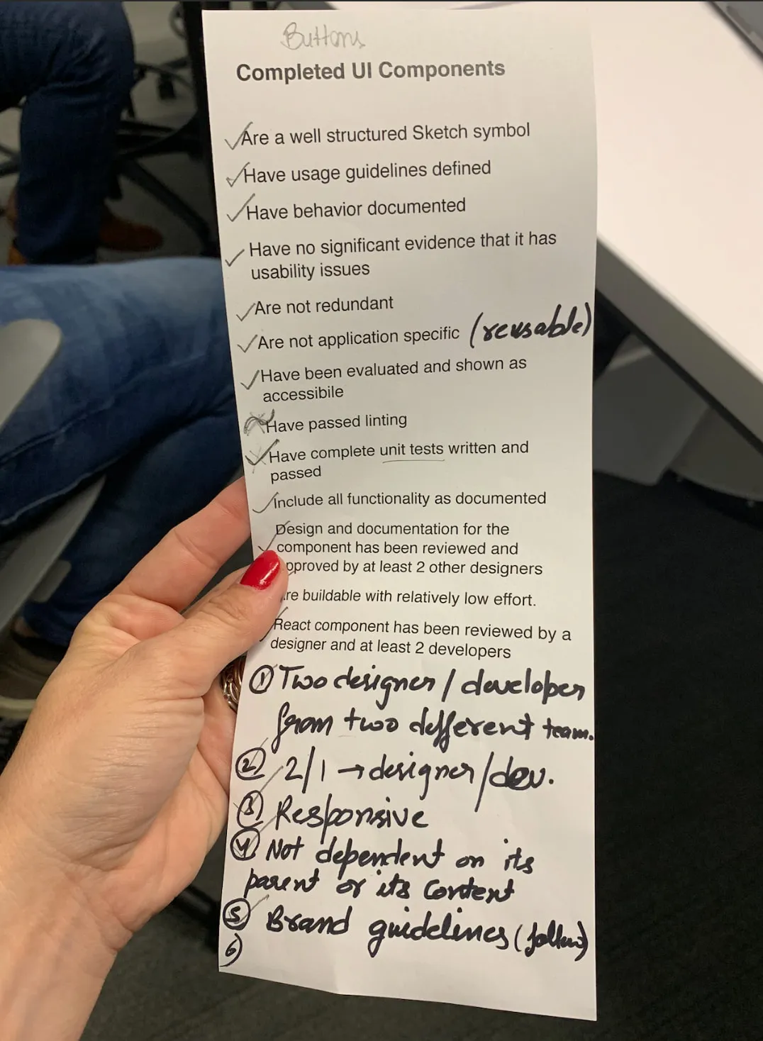 A piece of paper showing a checklist for a component definition of done used during a design system workshop.