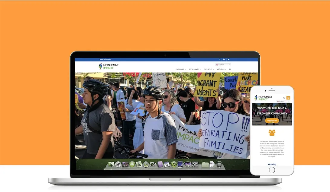 Mockup showing the Monument Impact website on a laptop and on a mobile screen.